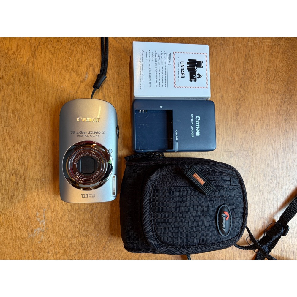 Canon PowerShot SD960 IS Digital ELPH Silver 12.1MP Camera Case Charger Bundle